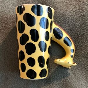 World Market yellow and black ceramic giraffe mug. Approx 5” x 6” x 3 1/2”